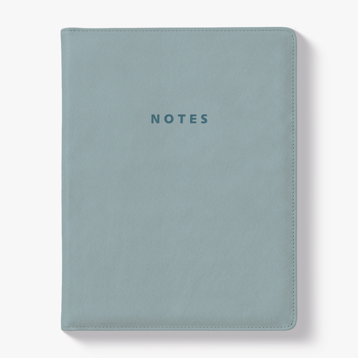 Notebook with a flexible leather-look cover sleeve in a duck egg blue tone – front view.