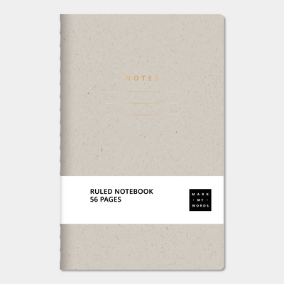 Mini pocket-sized lined notebook with vanilla cover with ruled pages and thread-sewn binding, front view.