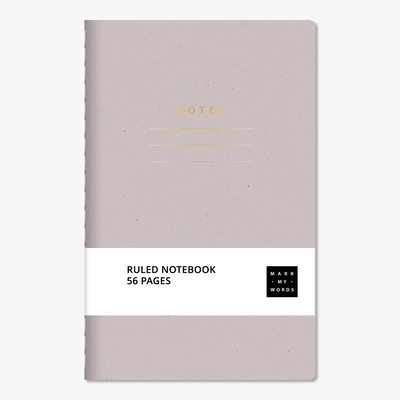 Pocket-sized notebook with ruled pages featuring a grape cover with gold foil accents – front view with informative paper wrap.
