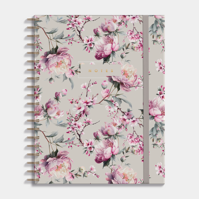 Hardcover spiral bound notebook with a design of cherry blossoms. Frontal view.