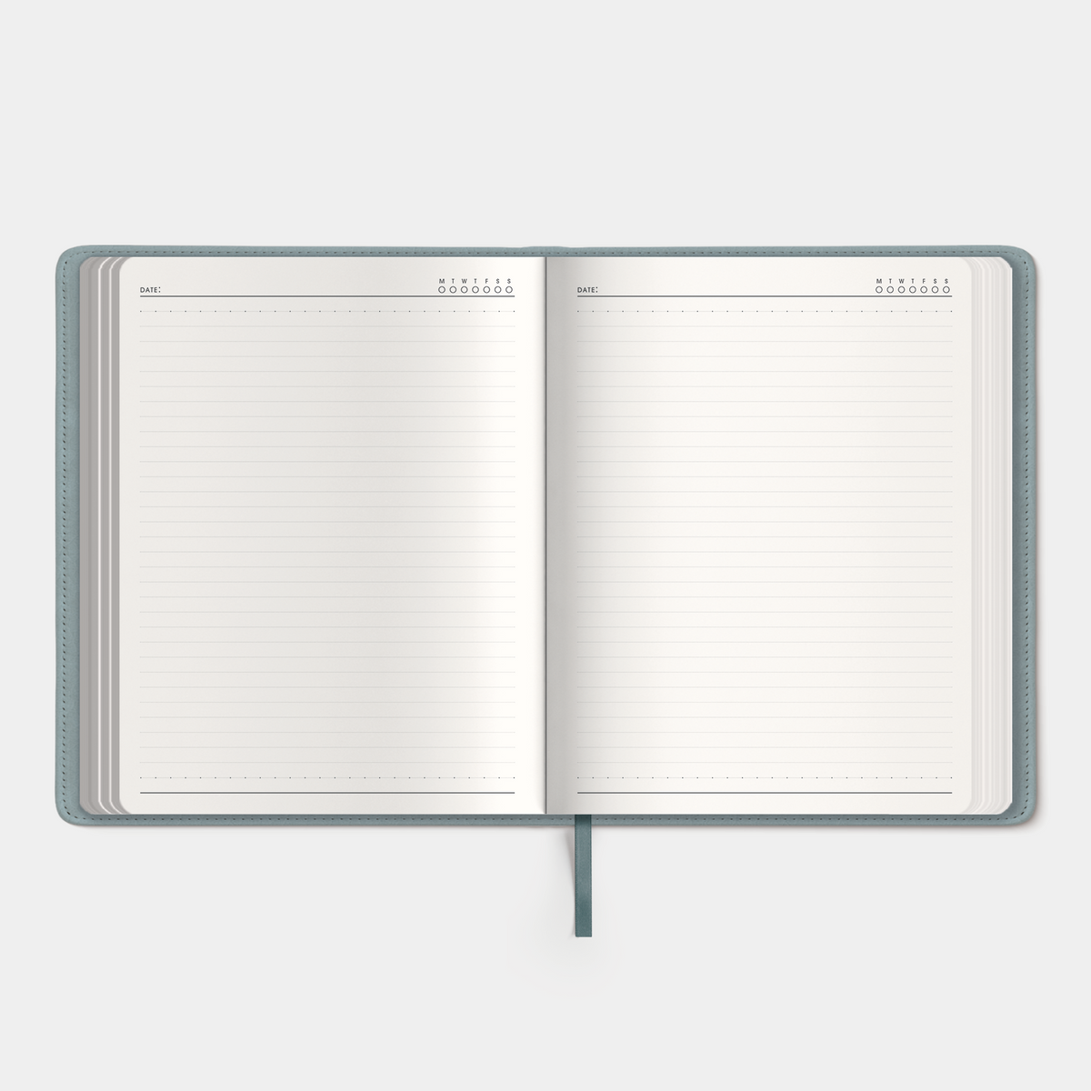 Notebook with a flexible leather-look cover sleeve in a duck egg blue tone – inside view of lined notes pages.