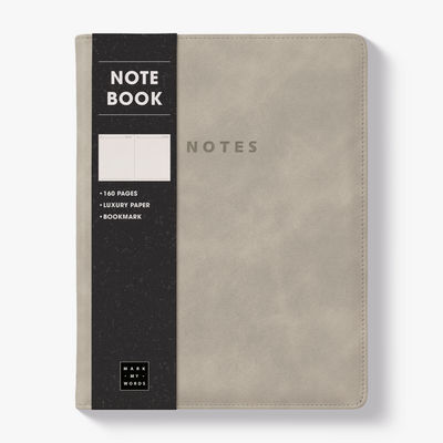 Notebook with a flexible suede-look cover sleeve in warm beige – front view with informative paper wrap.