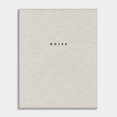 Notebook with a flexible cover of beige linen. Frontal view.