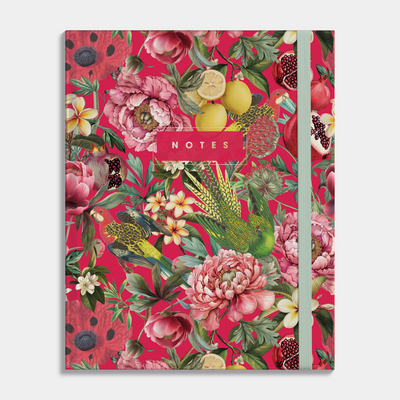 Hardcover notebook with a design of tropical fruits and birds on a red background. Frontal view.
